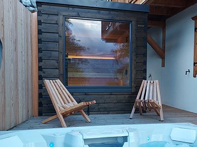 Sauna cabine sur terrasse avec spa américain